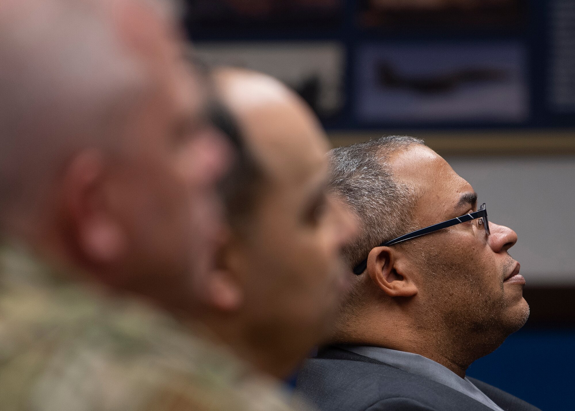 Lt. Col. (Ret.) Jeffrey Fason, Air Force Nuclear Weapon Center program manager, listens during the Dr. Martin Luther King Jr. Observance ceremony at Kirtland Air Force Base, N.M., Jan.15, 2019. Fason and the MLK committee invited Dr. Jack A. Taylor Jr, to be the guest speaker. (U.S. Air Force photo by Staff Sgt. J.D. Strong II)
