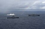 EAST CHINA SEA (Jan. 12, 2019) – The amphibious transport dock ship USS Green Bay (LPD 20) Japan Maritime Self-Defense Force amphibious transport dock ship JS Kunisaki (LST 4003), and amphibious assault ship USS Wasp (LHD 1) transit in formation during a cooperative deployment. Wasp, flagship of Wasp Amphibious Ready Group, is operating in the Indo-Pacific region to enhance interoperability with partners and serve as a ready-response force for any type of contingency
