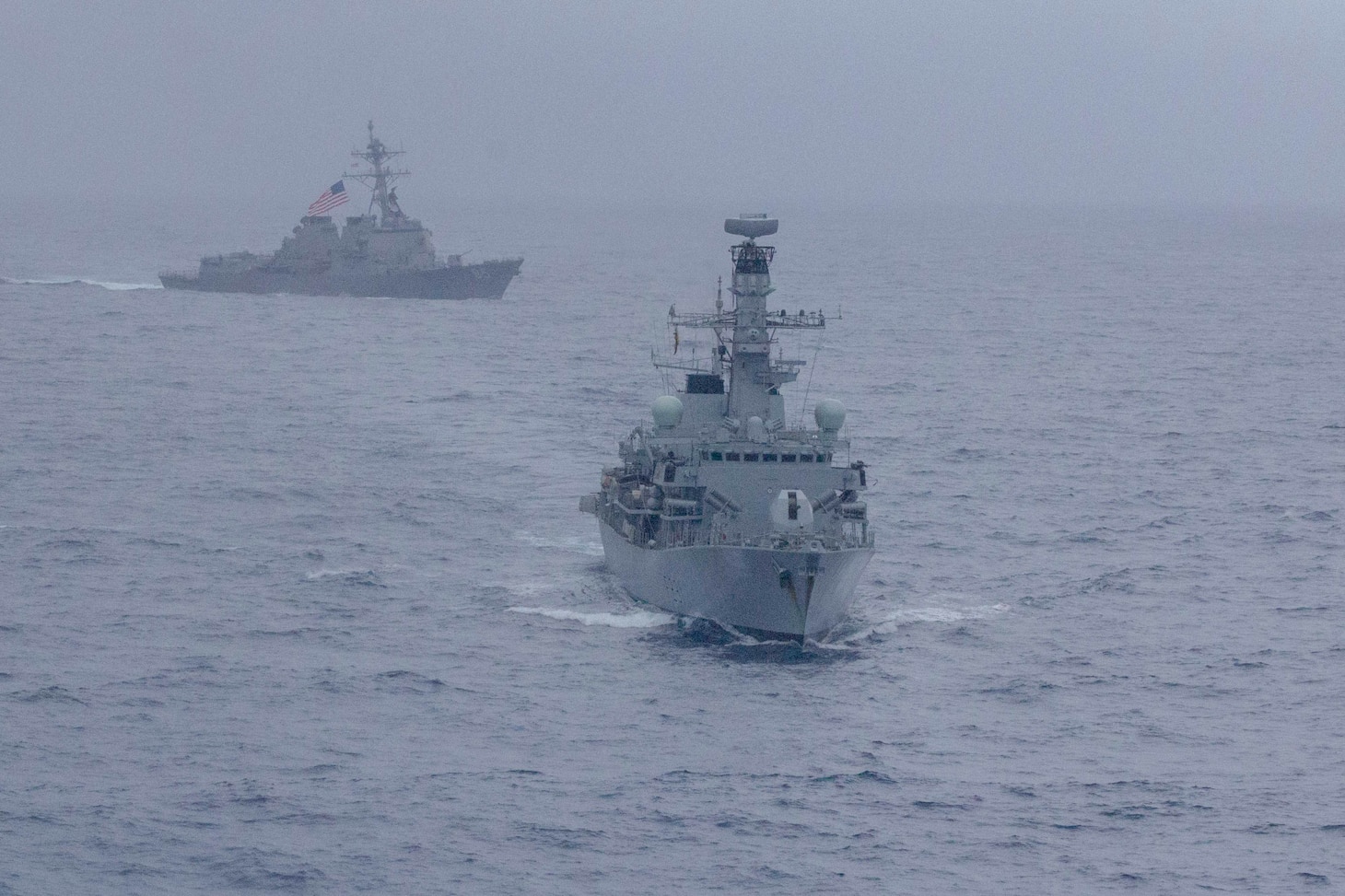 190115-N-WK982-1420 SOUTH CHINA SEA (Jan. 15, 2019) The Arleigh Burke-class guided-missile destroyer USS McCampbell (DDG 85) and the Royal Navy Type 23 ‘Duke’ Class guided-missile frigate HMS Argyll (F231) maneuver during a divisional tactics exercise. McCampbell is forward-deployed to the U.S. 7th Fleet area of operations in support of security and stability in the Indo-Pacific region.