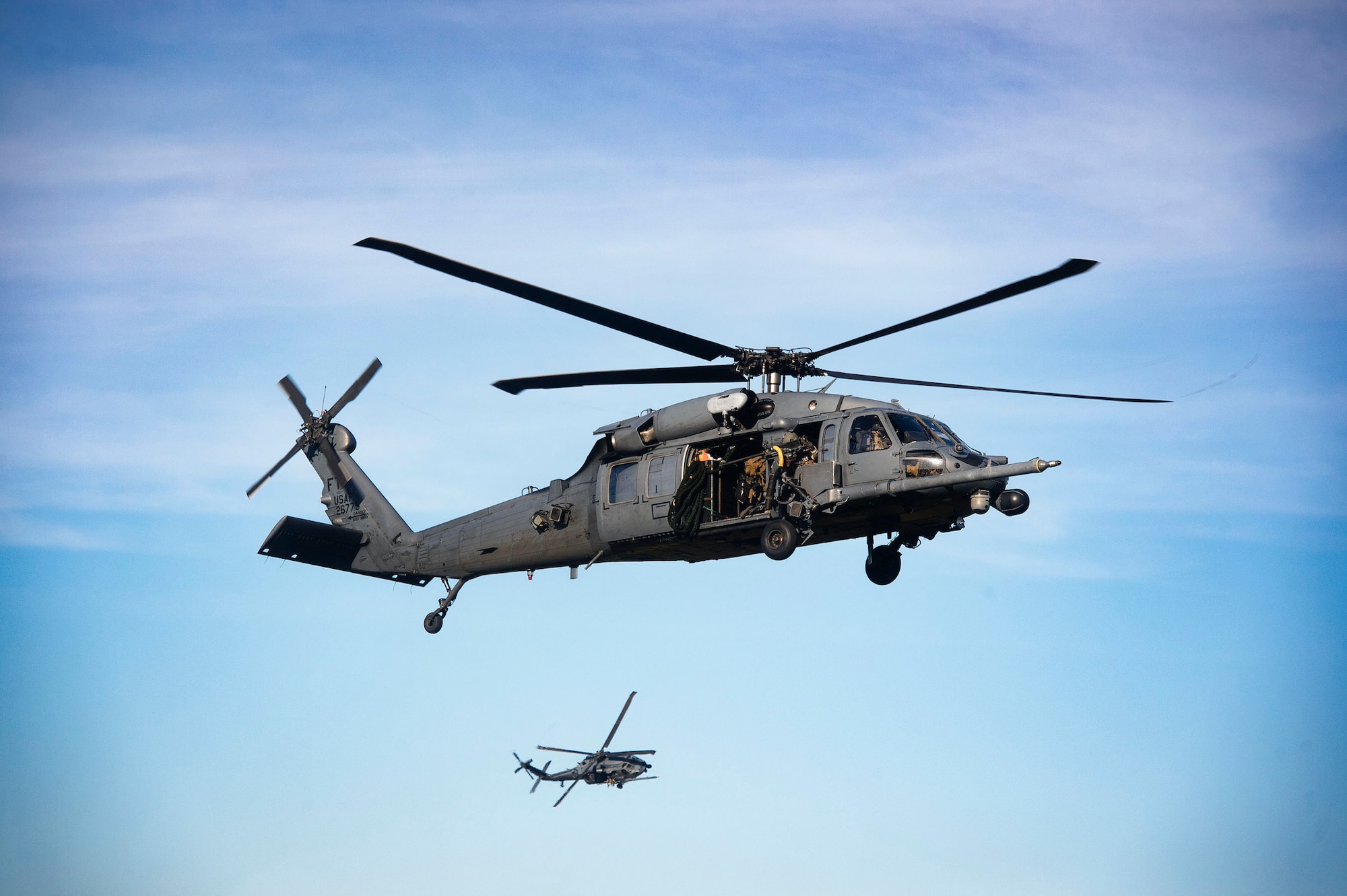 HH-60G Pave Hawks from the 41st Rescue Squadron (RQS) execute tactical maneuvers during a pre-deployment ‘spin-up’ exercise, Dec. 12, 2018, at Avon Park Air Force Range, Fla. During this pre-deployment ‘spin-up’ training, Moody’s 347th Rescue Group tested and maximized their combat search and rescue (CSAR) and personnel recovery capabilities. Under normal circumstances, the HH-60G Pave Hawk helicopter crews and maintainers deploy from Moody and integrate with Guardian Angel teams from different bases. This time, Moody’s 38th RQS and 41st RQS’s will deploy together and utilized this exercise to improve their mission readiness and cohesion before their departure. (U.S. Air Force photo by Senior Airman Greg Nash)