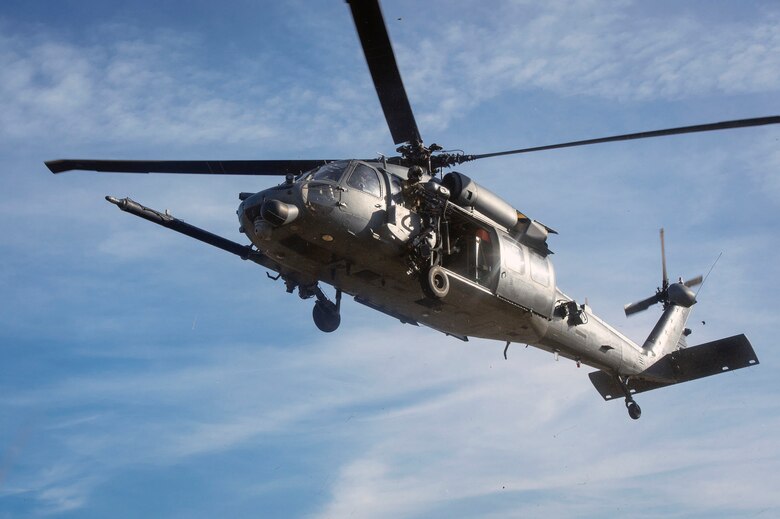A 41st Rescue Squadron special missions aviator scans for simulated enemy targets from an HH-60G Pave Hawk during pre-deployment ‘spin-up’ training, Dec. 12, 2018, at Avon Park Air Force Range, Fla. During this pre-deployment ‘spin-up’ training, Moody’s 347th Rescue Group tested and maximized their combat search and rescue (CSAR) and personnel recovery capabilities. Under normal circumstances, the HH-60G Pave Hawk helicopter crews and maintainers deploy from Moody and integrate with Guardian Angel teams from different bases. This time, Moody’s 38th RQS and 41st RQS’s will deploy together and utilized this exercise to improve their mission readiness and cohesion before their departure. (U.S. Air Force photo by Senior Airman Greg Nash)