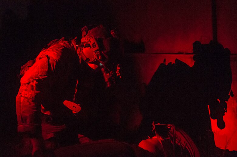 A pararescueman from the 38th Rescue Squadron assesses a patient’s wounds during a simulated personnel recovery scenario as part of a pre-deployment ‘spin-up’ exercise, Dec. 15, 2018, at Avon Park Air Force Range, Fla. During this pre-deployment ‘spin-up’ training, Moody’s 347th Rescue Group tested and maximized their combat search and rescue (CSAR) and personnel recovery capabilities. Under normal circumstances, the HH-60G Pave Hawk helicopter crews and maintainers deploy from Moody and integrate with Guardian Angel teams from different bases. This time, Moody’s 38th RQS and 41st RQS’s will deploy together and utilized this exercise to improve their mission readiness and cohesion before their departure. (U.S. Air Force photo by Senior Airman Greg Nash)