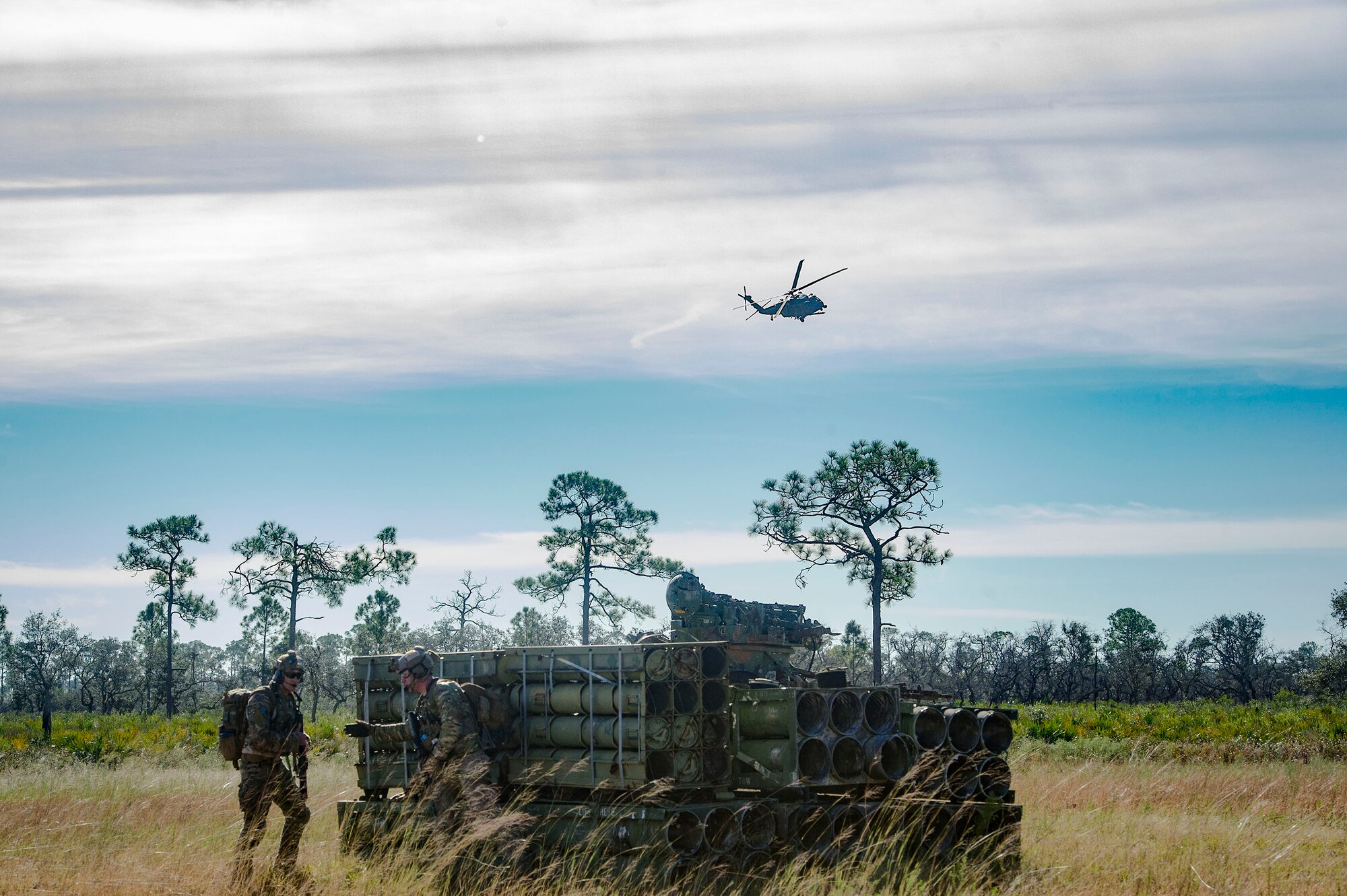Pararescuemen from the 38th Rescue Squadron position themselves on a mock battlefield during a pre-deployment ‘spin-up’ exercise, Dec. 12, 2018, at Avon Park Air Force Range, Fla. During this pre-deployment ‘spin-up’ training, Moody’s 347th Rescue Group tested and maximized their combat search and rescue (CSAR) and personnel recovery capabilities. Under normal circumstances, the HH-60G Pave Hawk helicopter crews and maintainers deploy from Moody and integrate with Guardian Angel teams from different bases. This time, Moody’s 38th RQS and 41st RQS’s will deploy together and utilized this exercise to improve their mission readiness and cohesion before their departure. (U.S. Air Force photo by Senior Airman Greg Nash)