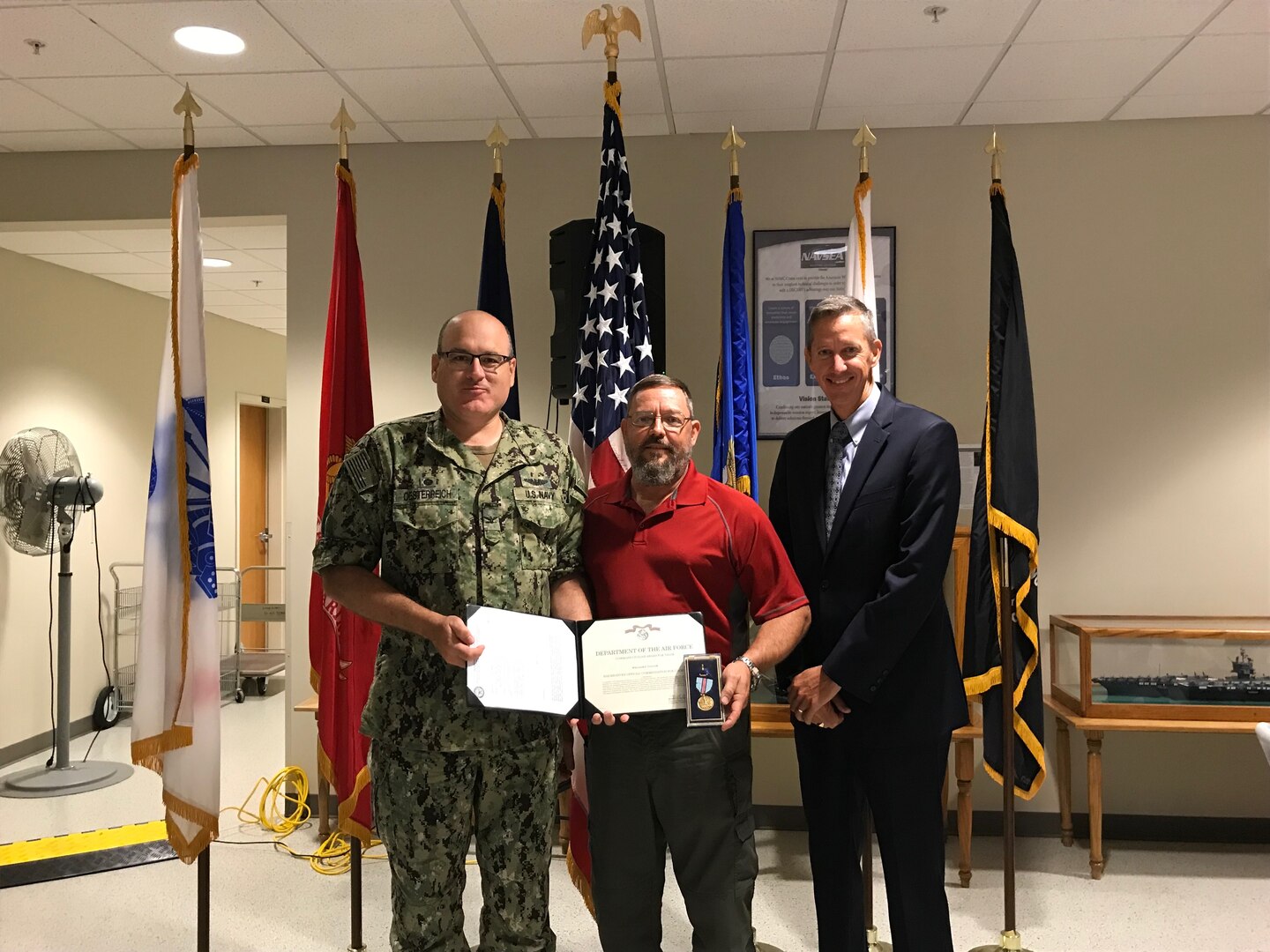 NSWC Crane employee was awarded one of the highest civilian honors for an act of bravery overseas. William (Bill) Taylor, an AC-130W Weapons Specialist at NSWC Crane, received the Command Civilian Service Medal for Valor and Courage in a combat zone for saving seven lives and extinguishing a fire.