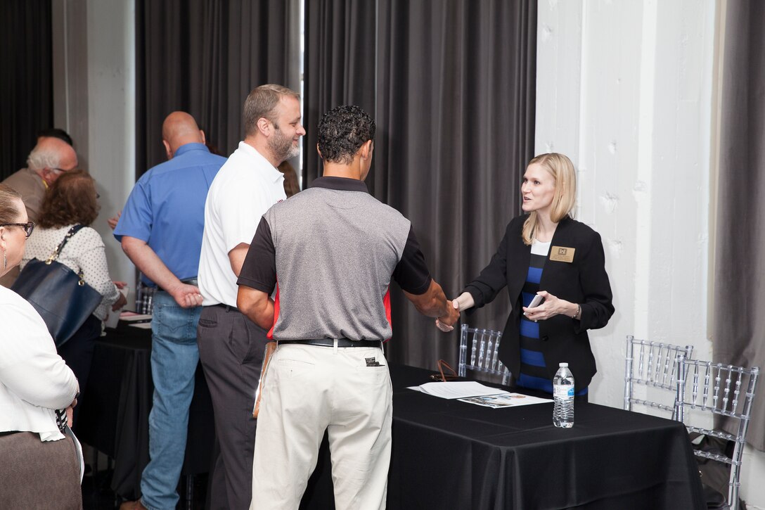Deputy of Small Business meets with contractors at Open House