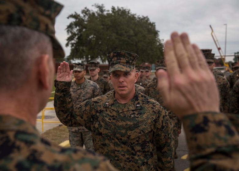 U.S. Marine Corps Chief Warrant Officer Matthew Kessinger, personnel officer of 6th Marine Corps District recites the oath of office during his promotion to chief warrant officer five aboard Marine Corps Recruit Depot Parris Island, South Carolina, Dec. 19, 2018. Kessinger, a native of Louisville, Kentucky, has currently served 28 years in the Marine Corps. (U.S. Marine Corps photo by Lance Cpl. Jack A. E. Rigsby)
