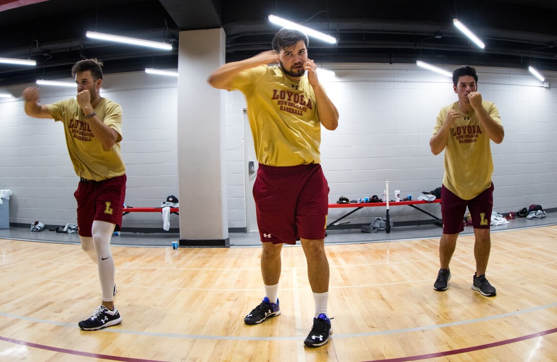 Members of the Loyola University New Orleans baseball team practice techniques from the Marine Corps Martial Arts Program at Loyola University New Orleans, Jan. 12, 2019. Master Sgt. Bryan Smith, assistant Marine officer instructor for Tulane University and Marines with Marine Forces Reserve led a workout session that was physically and mentally challenging. The workout session was comprised of four events; incentive training, shamrock drill, MCMAP demonstrations and casualty evacuation drills. (U.S. Marine Corps photo by Sgt. Andy O. Martinez)