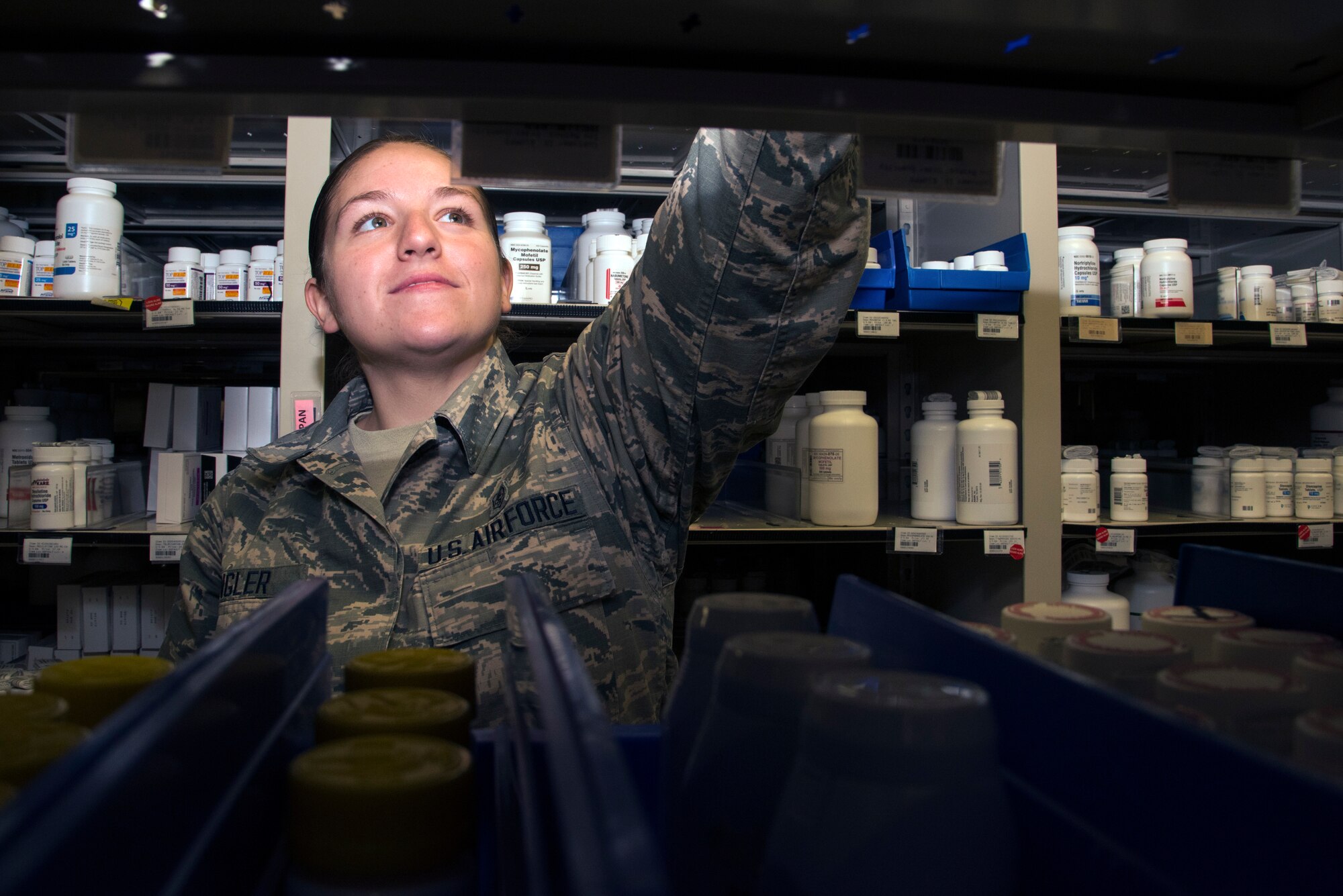 U.S. Air Force Airman 1st Class Sydney Klinger, a 6th Medical Support Squadron pharmacy technician, locates a prescription bottle at MacDill Air Force Base, Fla., Jan. 11, 2019.