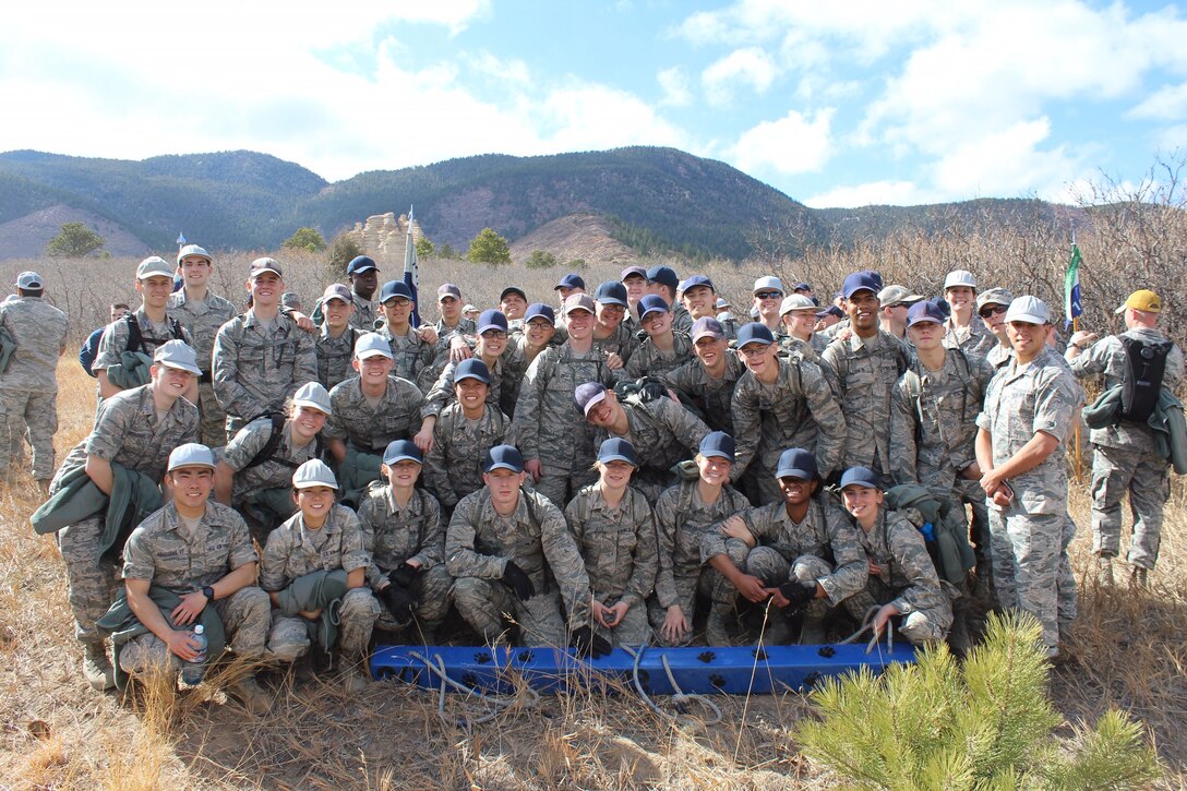 Maj. Brian Low, Air Officer Commanding, poses for a photo with his cadets as part of the U.S. Air Force Academy’s Recognition in Colorado, March 2017. Recognition is the formal three-day finale of the fourth-class year (the freshman year at traditional universities) when the cadets are recognized as upper-class cadets and are allowed to wear the Prop and Wings insignia on their flight caps. During his time as and AOC, Low was responsible for 115 cadets and their military training to prepare them to be officers.