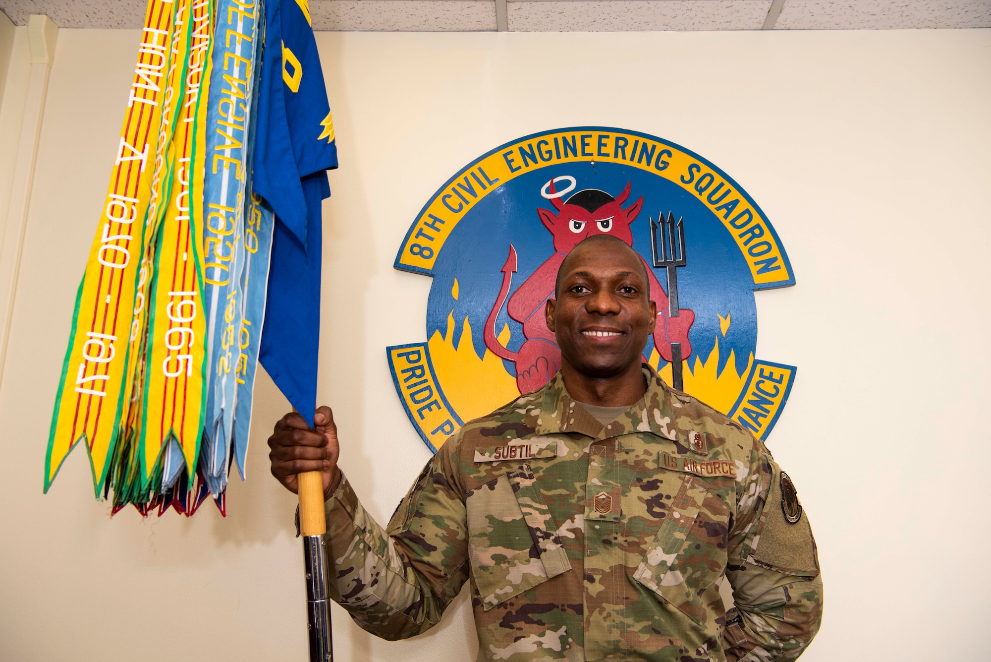 U.S. Air Force Master Sgt. Larwens Subtil, 8th Civil Engineer Squadron first sergeant, poses for a photo in his office at Kunsan Air Base, Republic of Korea, Jan. 11, 2019. Subtil immigrated to the U.S. from Haiti, joined the Air Force, and is currently serving his 15th year in the military. (U.S. Air Force photo by Staff Sgt. Joshua Edwards)