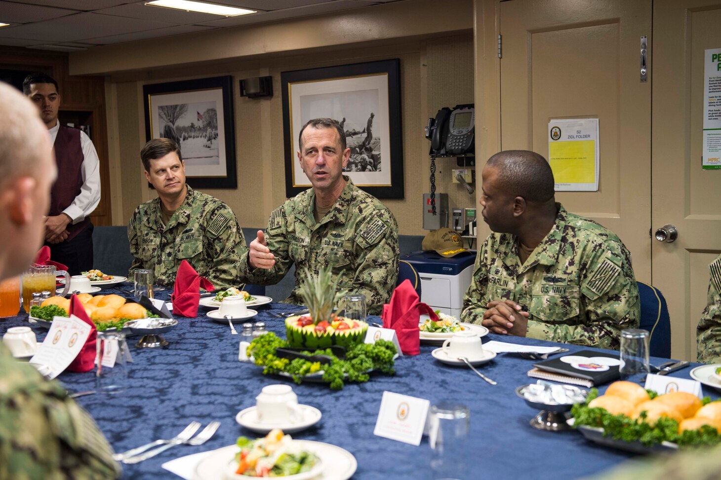 Chief of Naval Operations (CNO) Adm. John Richardson sits down for lunch with commanding officers from forward deployed ships inside the wardroom of the Arleigh Burke-class guided-missile destroyer USS Benfold (DDG 65). Benfold is forward-deployed to the U.S. 7th Fleet area of operations in support of security and stability in the Indo-Pacific region.