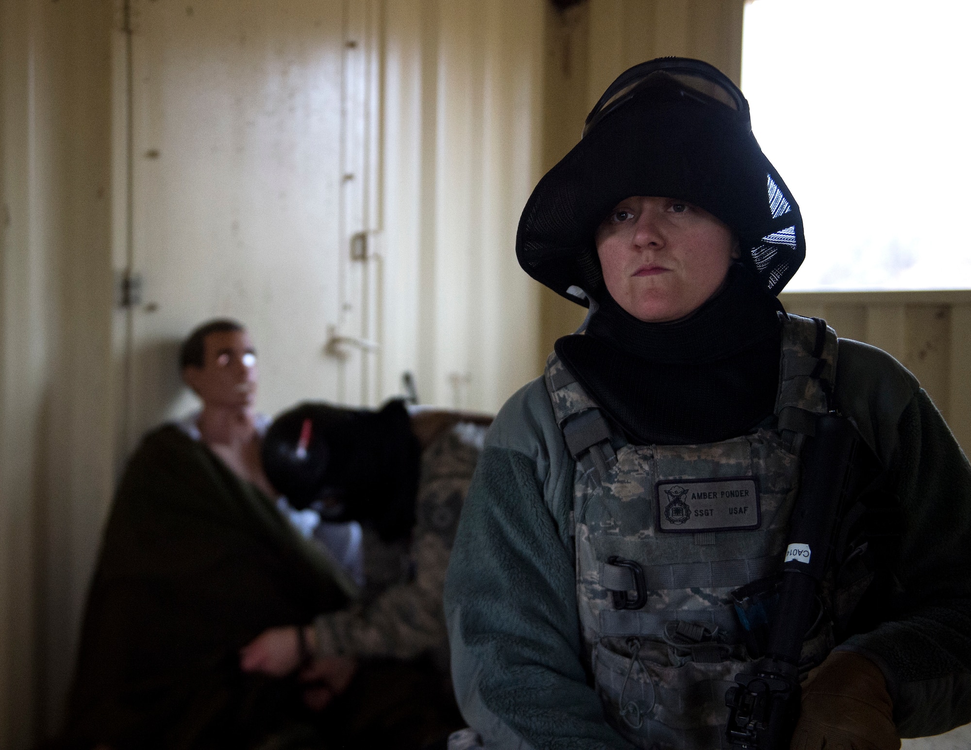 U.S. Air Force Staff Sgt. Amber Ponder, 133rd Security Forces Squadron, provides security for medical personnel at the Arden Hills Army Training Site in Arden Hills, Minn., Nov. 16, 2018.