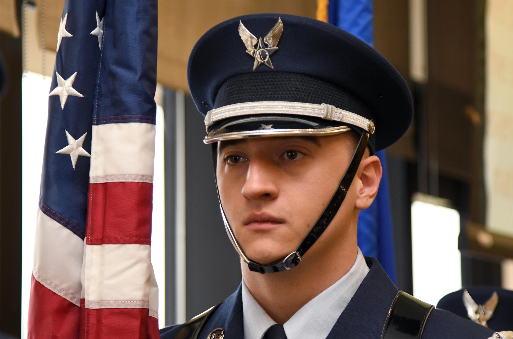 U.S. Air Force Senior Airman Miklo Miller, Keesler Honor Guard member, presents the colors at the annual Dr. Martin Luther King Jr. Memorial Luncheon inside the Bay Breeze Event Center at Keesler Air Force Base, Mississippi, Jan. 15, 2019. The 81st Training Wing and Wing Staff Agencies hosted the event honoring King's legacy and his efforts to inspire civil rights activism within the African-American community. He was only 35 years old when he was awarded the Nobel Peace Prize in 1964. (U.S. Air Force photo by Kemberly Groue)