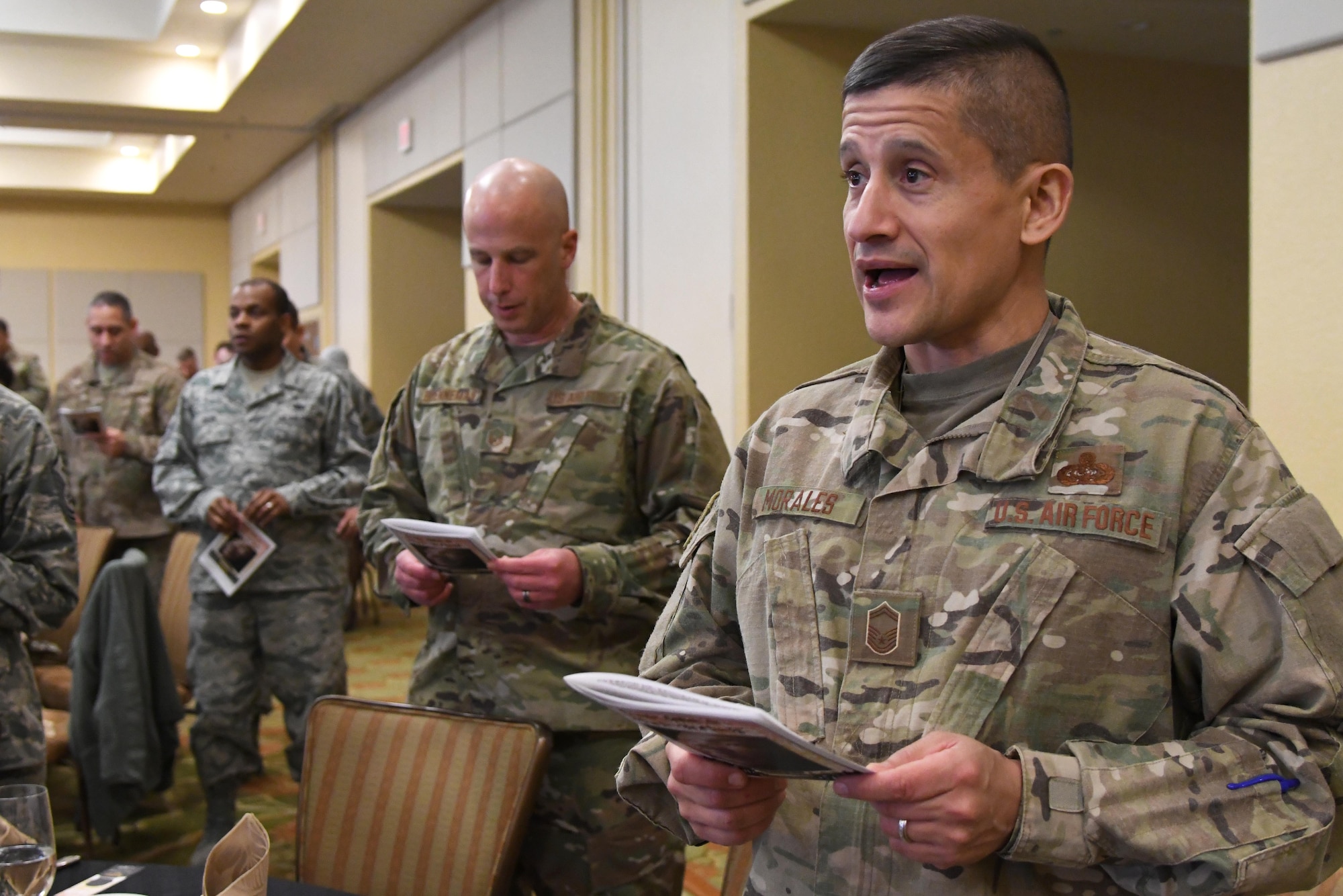 U.S. Air Force Senior Master Sgt. Leo Morales, Mathies NCO Academy director of education, participates in singing the song, Lift Every Voice and Sing, at the annual Dr. Martin Luther King Jr. Memorial Luncheon inside the Bay Breeze Event Center at Keesler Air Force Base, Mississippi, Jan. 15, 2019. The 81st Training Wing and Wing Staff Agencies hosted the event honoring King�s legacy and his efforts to inspire civil rights activism within the African-American community. He was only 35 years old when he was awarded the Nobel Peace Prize in 1964. (U.S. Air Force photo by Kemberly Groue)