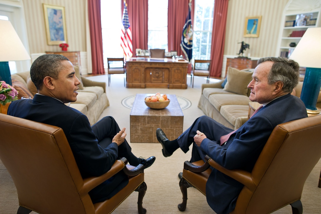 President Barack Obama meets with President George H.W. Bush in Oval Office, February 15, 2011