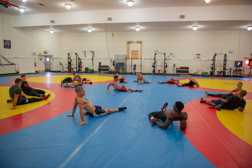 Wrestlers stretching