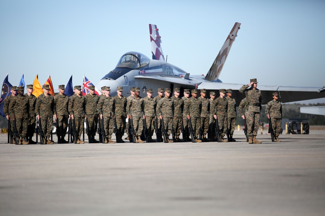 Marines stand in formation during VMFA-115’s change of command ceremony aboard Marine Corps Air Station Beaufort, Jan. 11. During the ceremony Lt. Col. Jonathan Curtis relinquished command of the squadron to Lt. Col. Edmund Hipp