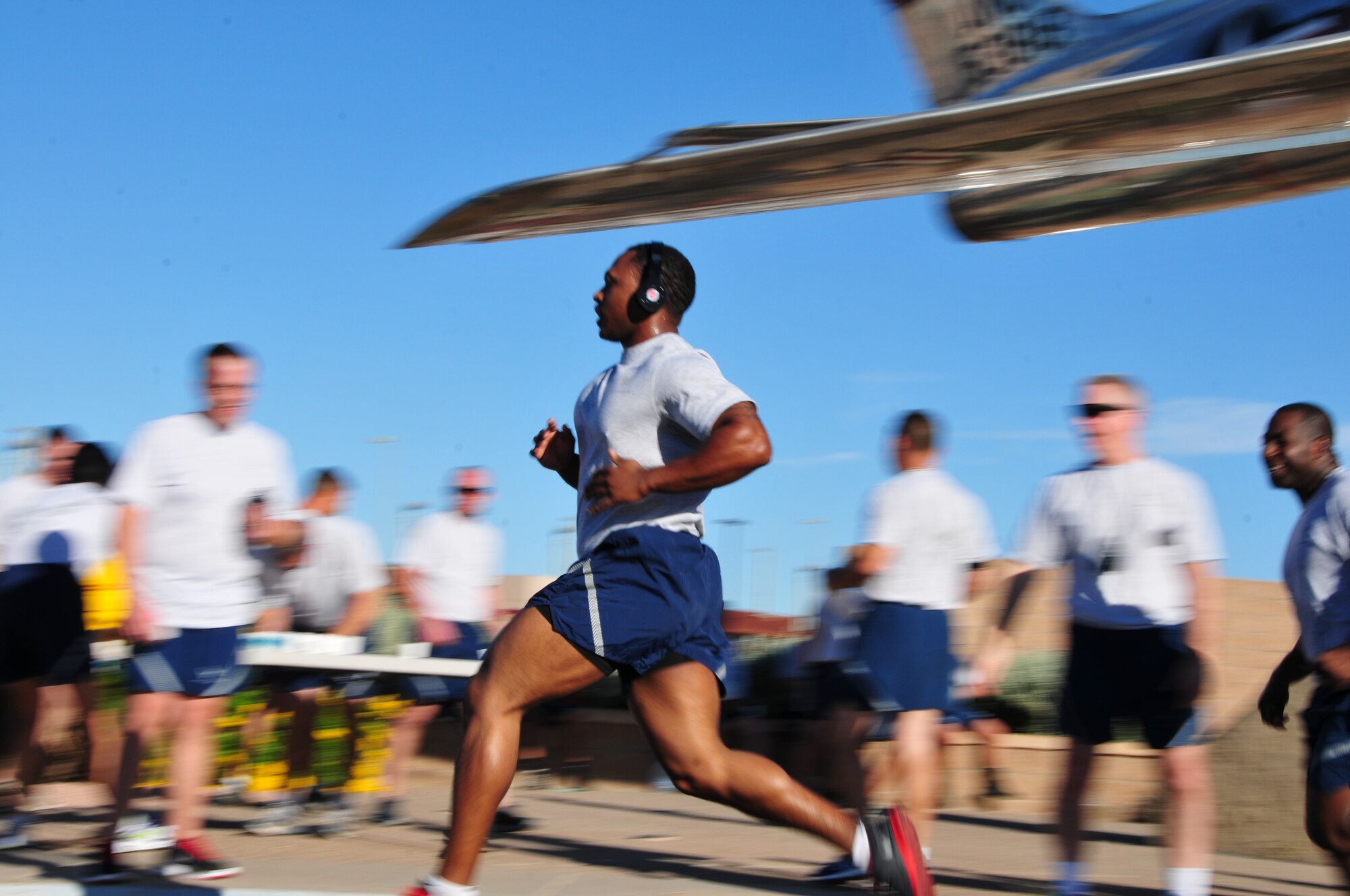 Airmen from the 161st Air Refueling Wing participate in their Air Force Physical fitness Test's 1.5-mile run. Rowing, biking, swimming and elliptical training can all develop endurance and have a positive impact to an Airman’s PFT score. (Courtesy photo by 161st Air refueling Wing)