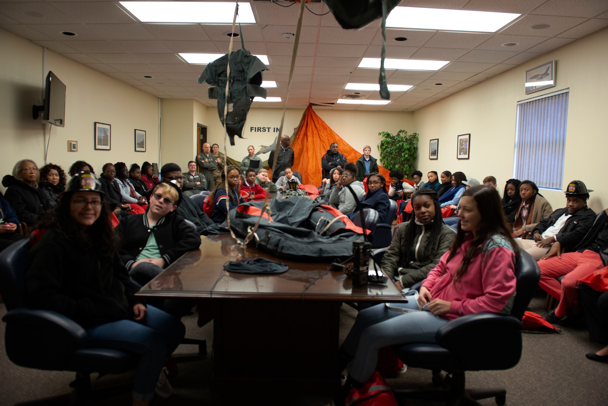 Students from five local middle schools interact with 20th Operations Group Survival Evasion Resistance and Escape (SERE) Airmen at Shaw Air Force Base, S.C., Jan.11, 2019.