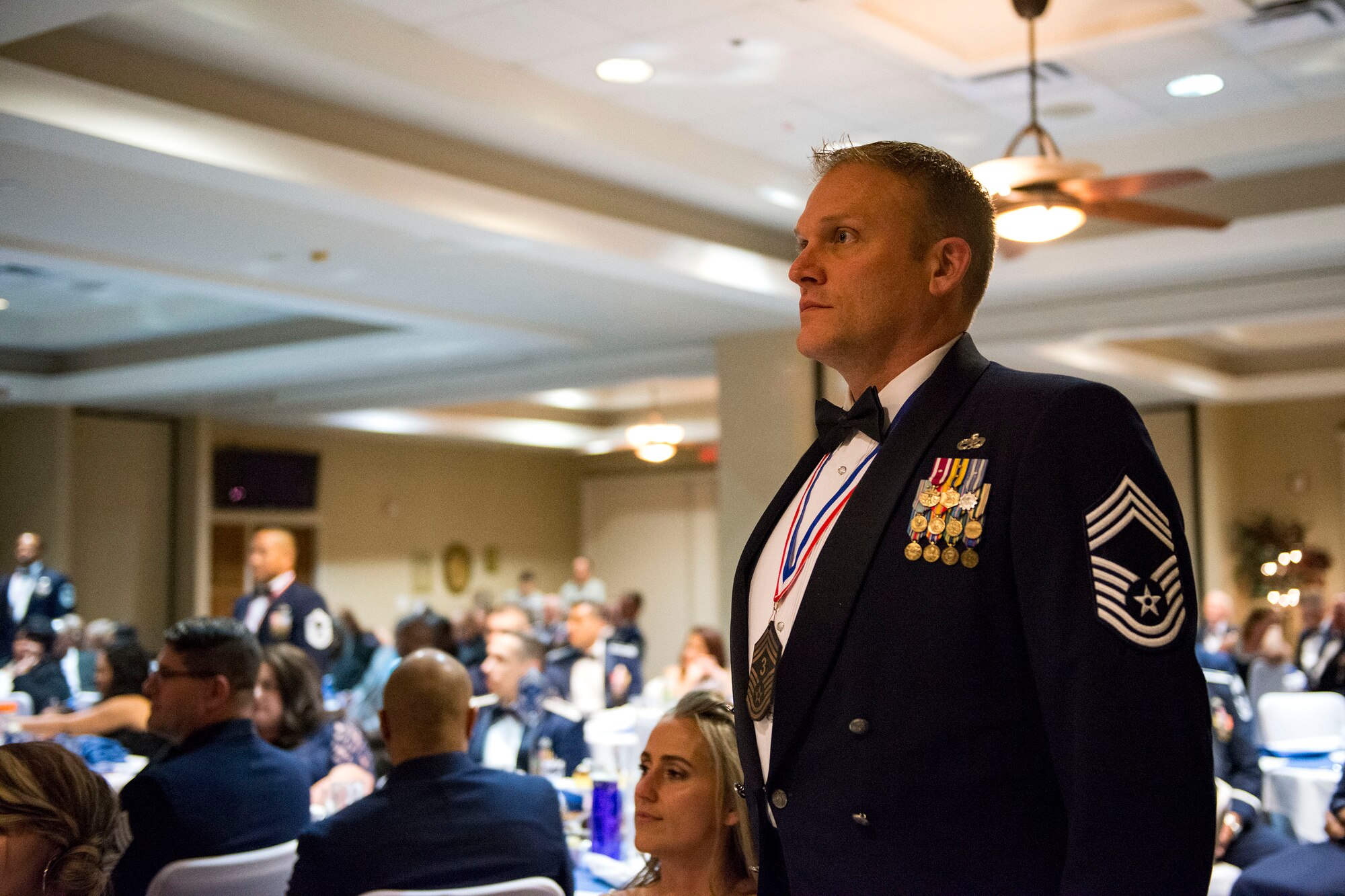 Chief Master Sgt. Jeffrey Zimmerman, 23d Aircraft Maintenance Squadron superintendent, stands for the chief’s oath during a Chief Recognition Ceremony, Jan. 11, 2018, at Moody Air Force Base, Ga. As one of the oldest military traditions, the ceremony recognized members selected for promotion to the rank of chief, a rank which only one percent of the Air Force’s total enlisted force hold. (U.S. Air Force photo by Airman 1st Class Erick Requadt)
