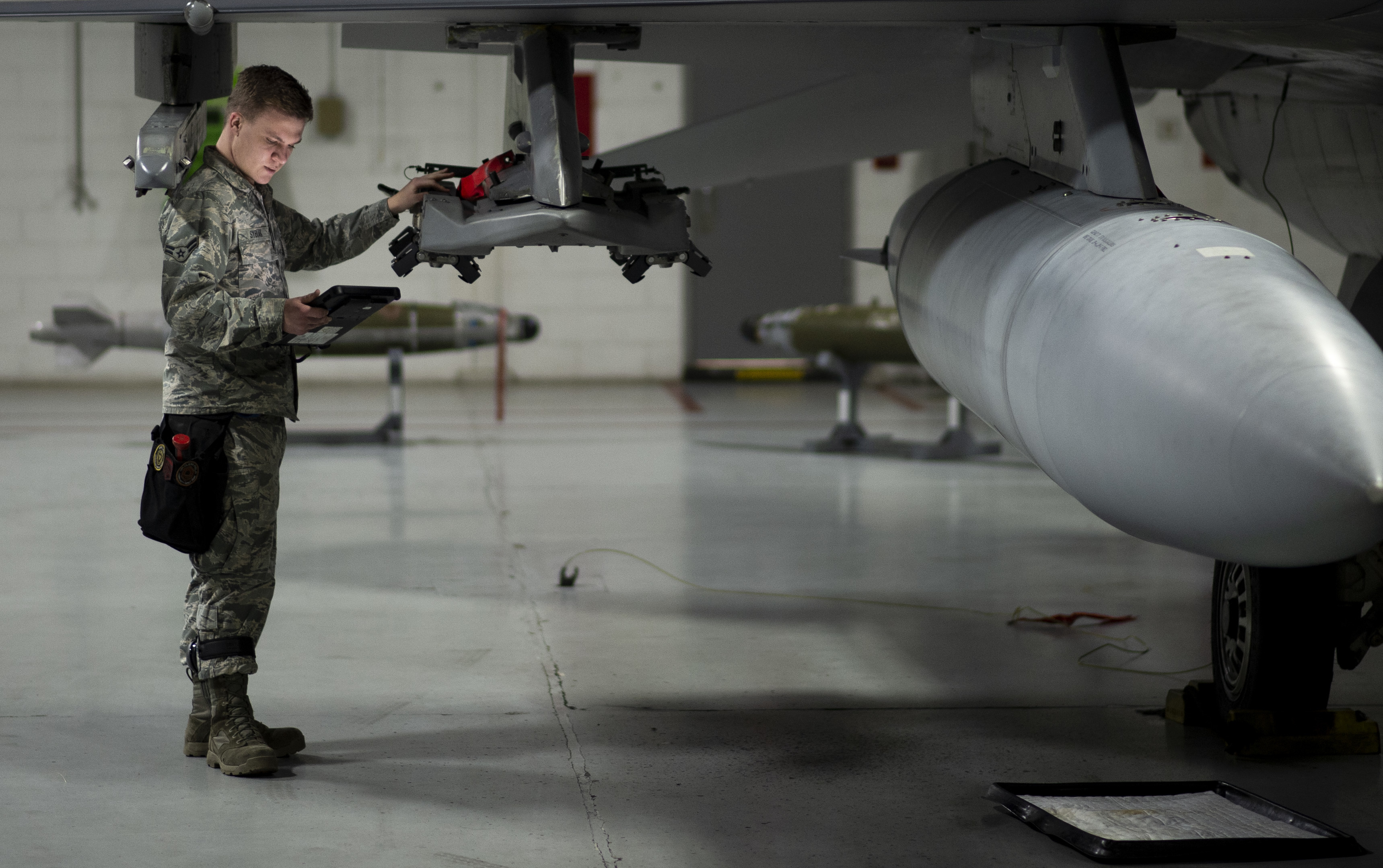 Loading and unloading munitions
