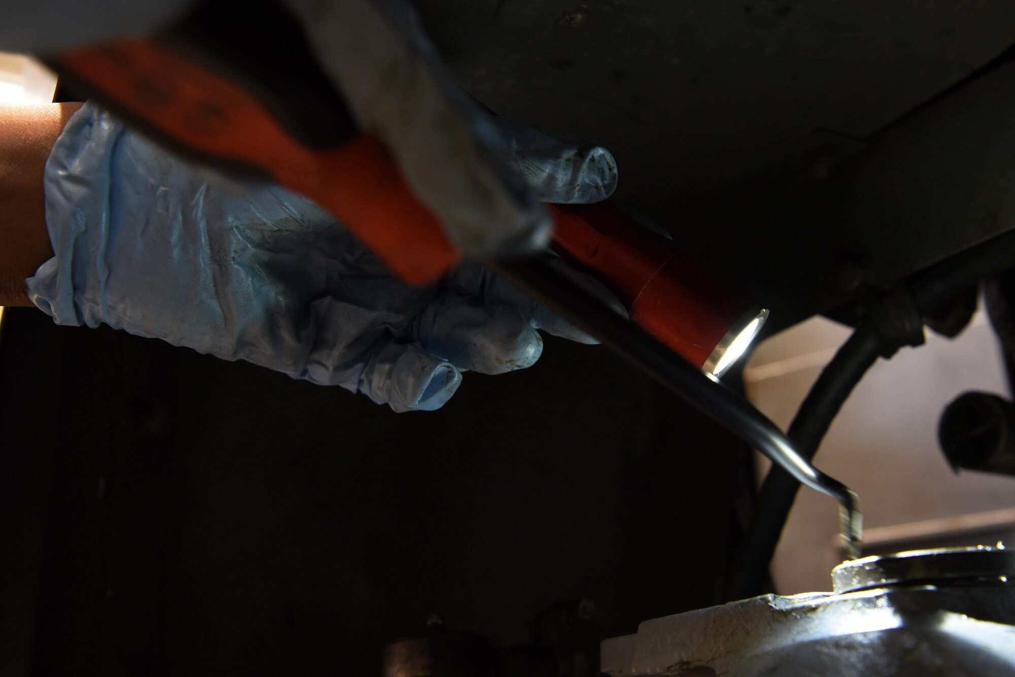 U.S. Air Force Senior Airman Dom Allen, 20th Equipment Maintenance Squadron aerospace ground equipment technician, makes repairs to a munitions jammer 1-B bomb lift at Shaw Air Force Base, S.C., Jan. 16, 2019.