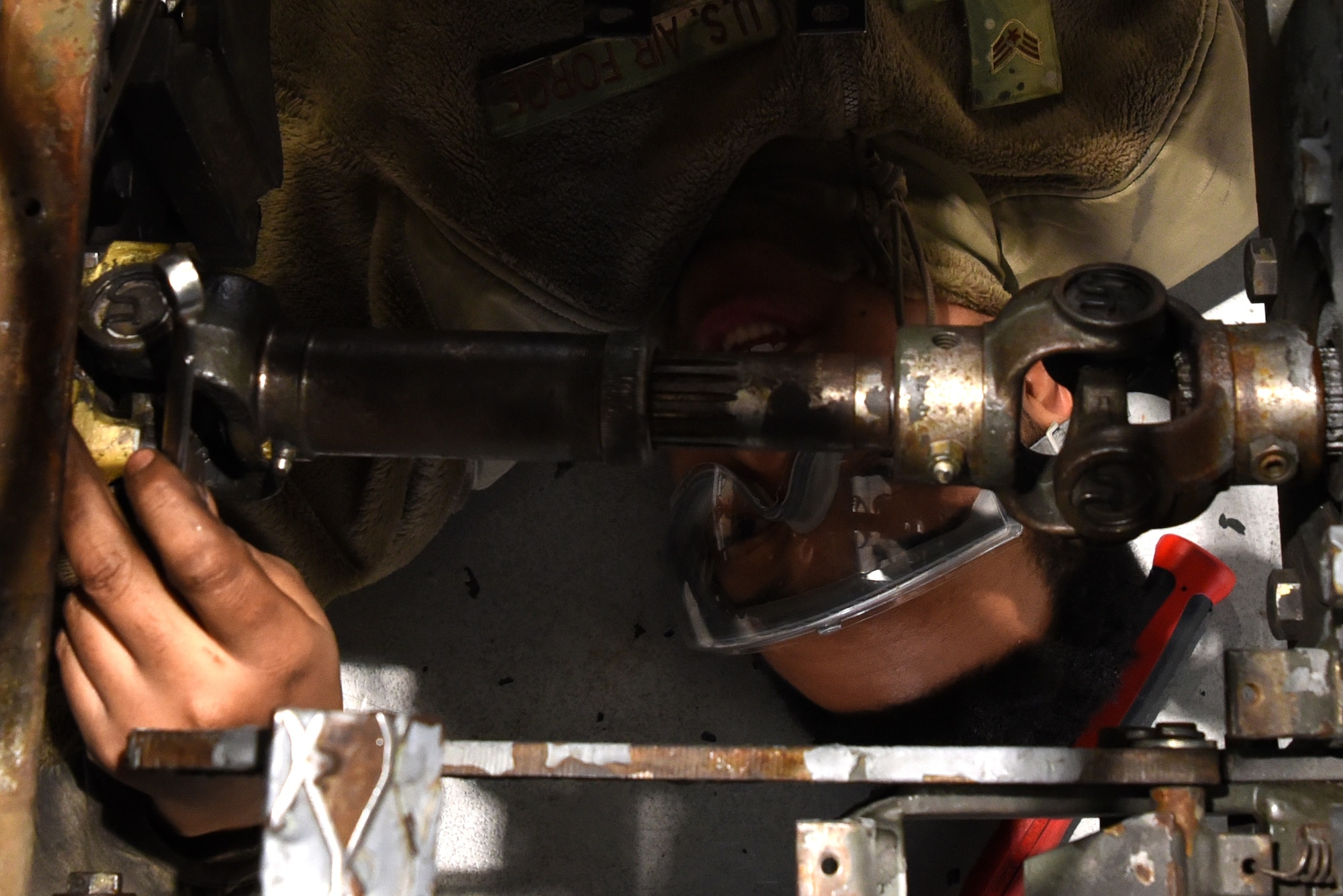 U.S. Air Force Senior Airman Dom Allen, 20th Equipment Maintenance Squadron aerospace ground equipment (AGE) technician, repairs a munitions jammer 1-B bomb lift at Shaw Air Force Base, S.C., Jan. 16, 2019.
