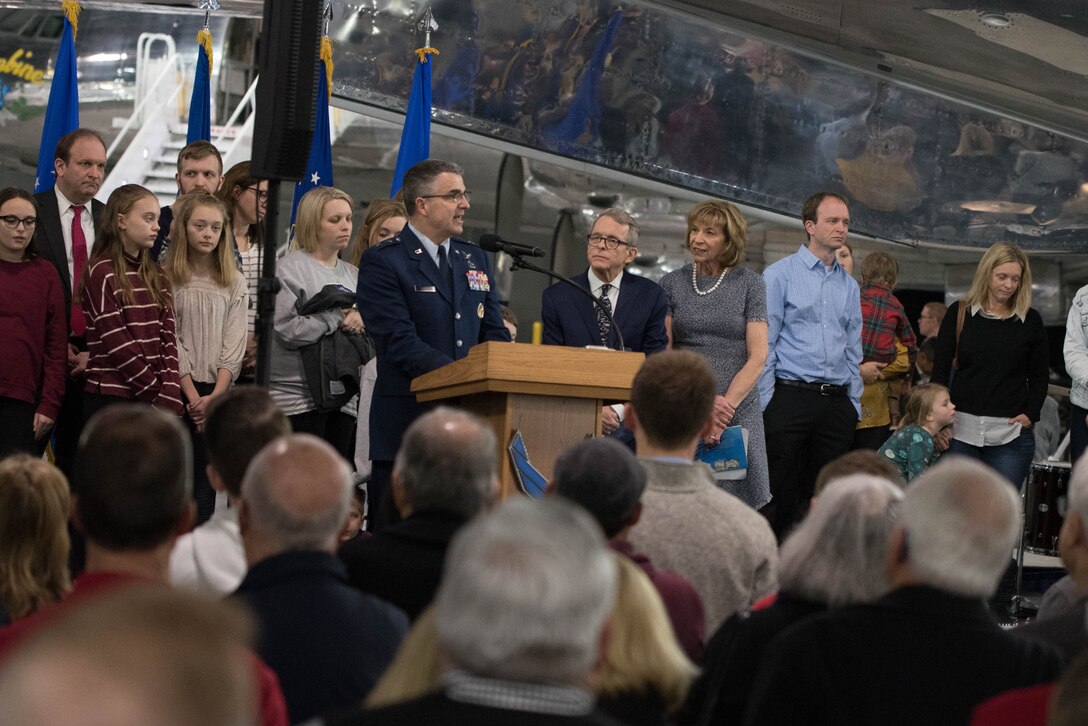 U.S. Air Force Maj. Gen. William Cooley, commander, Air Force Research laboratory, gives the opening remarks for the Science, Discovery and Family Fun Event held at the National Museum of the U.S. Air Force, Wright-Patterson Air Force Base, Jan. 13. Joining the general was Ohio Gov. Mike DeWine and his wife Fran.