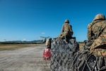 Agents from Panama’s National Border Service wait to load slings onto a U.S. Army CH-47 Chinook headed to the Darien Province in the Republic of Panama, Jan. 11, 2019.