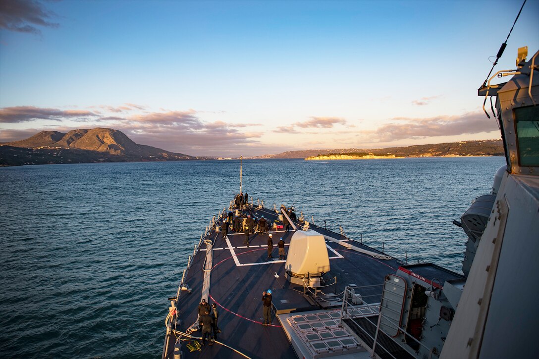 A ship arrives in a bay.