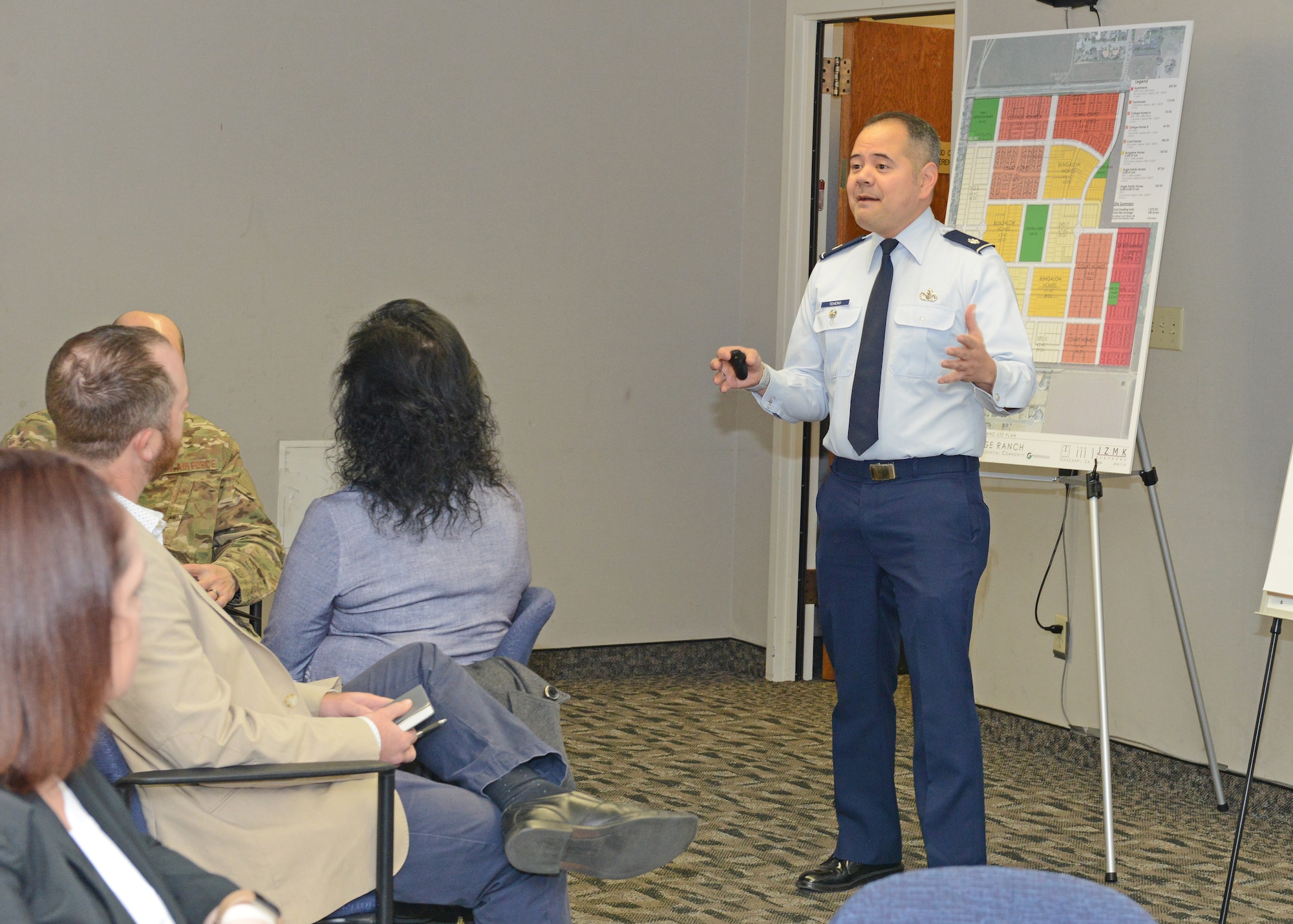 Lt. Col. James Tehero, Secretary of the Air Force, Installation, Environment and Energy, discusses the importance of the Air Force Community Partnership program with more than 60 attendees at the Airman and Family Readiness Center Jan. 10. (U.S. Air Force photo by Kenji Thuloweit)