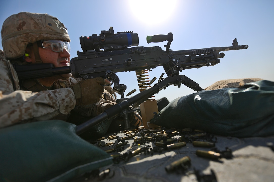 A Fleet Anti-Terrorism Security Team, Central Command, Marine fires the M240B machine gun during battle sight zeroing range training to calibrate weaponry and maintain mission readiness. FASTCENT provides expeditionary antiterrorism and security forces to embassies, consulates and other vital national assets throughout the region.