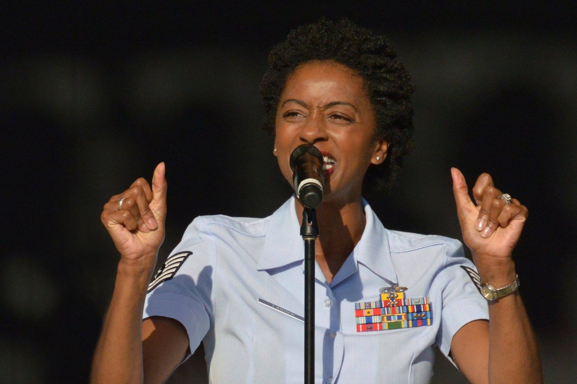 DAYTON, Ohio - TSgt.Felita LaRock performing with the Air Force Band of Flight in July 2014 at the Fraze Pavilion. (U.S. Air Force photo by Ken LaRock)