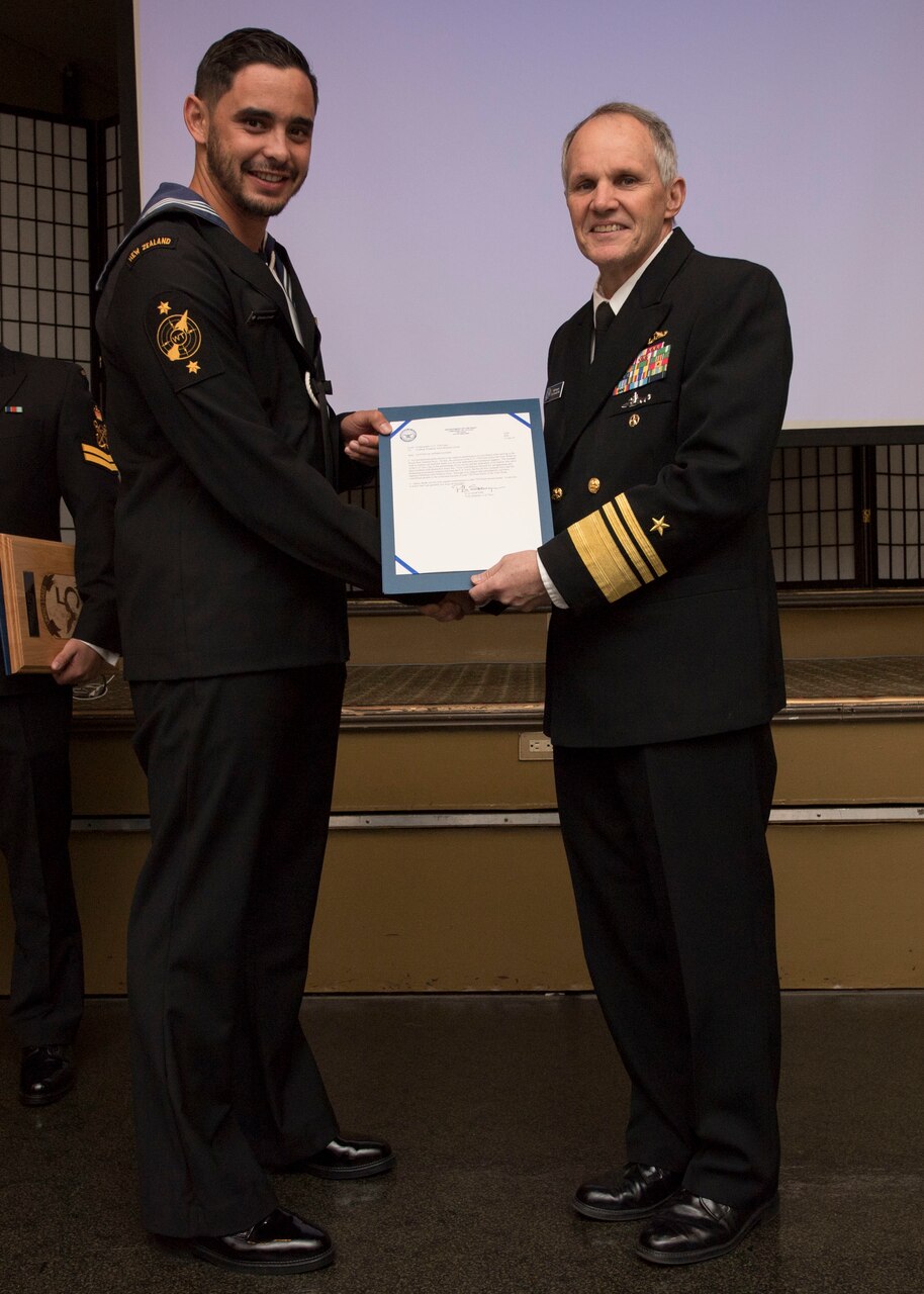 YOKOSUKA, Japan (Jan, 17 2019) - Vice Adm. Phil Sawyer poses with Royal New Zealand Navy Leading Weapons Technician Wiremu Lovett at the announcement luncheon during 7th Fleet Sailor of the Year competition. The 7th Fleet Sailor of the Year Week is designed to share with these outstanding Sailors the unique operational environment in the 7th Fleet as well as enhance regional partnerships with like-minded forces.