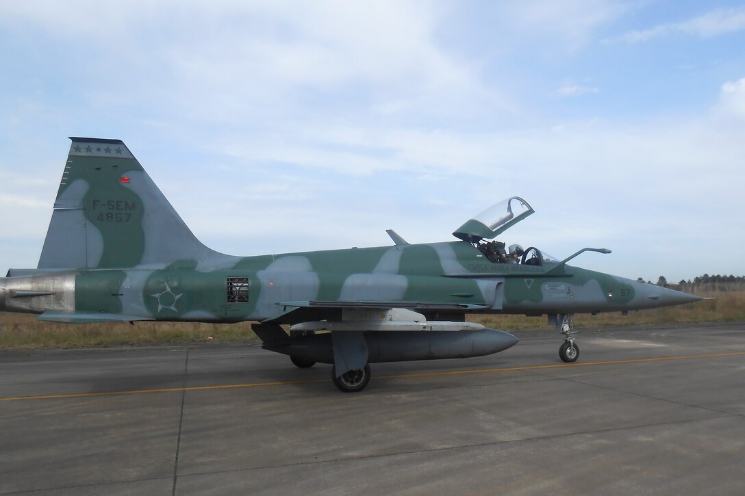 An F-5EM Tiger II aircraft belonging to the Brazilian Air Force Força Aérea Brasileira sits on a runway Aug. 2 at Canoas Air Force Base, Canoas, Brazil. Members of the U.S. Air Force International Engine Management Program, based at Tinker Air Force Base, visited Brazil July 27-Aug. 11 to help the ally create a standardized engine for the aircraft and reactivate and correlate engine test cells.