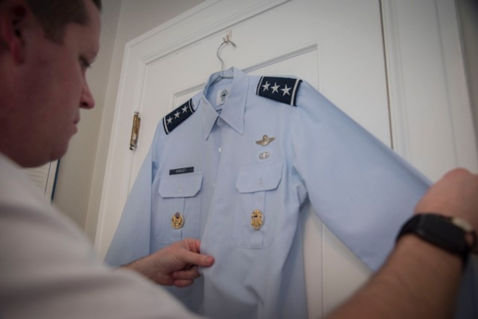 Master Sgt. Brian Hall, enlisted aide to the commander of Air Education and Training Command, inspects his general officer’s uniform Jan. 10, 2019, in the Clark House at Joint Base San Antonio-Randolph, Texas.  As an enlisted aide, it is a part of Hall’s duty to prepare and maintain the uniform daily.