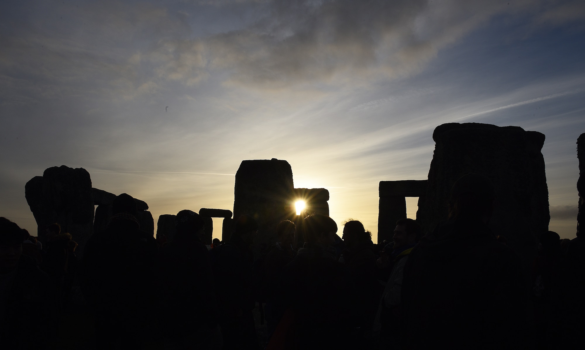 The sun rises following the winter solstice at Stonehenge, England, Dec. 22, 2018. Each year, thousands of people visit to celebrate the summer and winter solstices in and around the stone circle. (U.S. Air Force photo by Airman 1st Class Madeline Herzog)