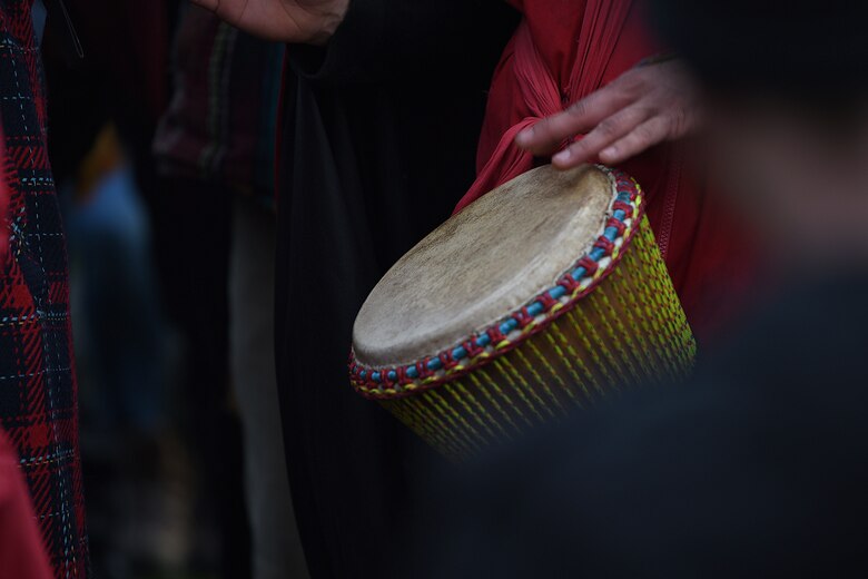 A man plays a drum during the winter solstice celebration at Stonehenge, England, Dec. 22, 2018. During the winter solstice, the earth’s axis is tilted at its furthest point from the sun, which results in the shortest day of the year in the northern hemisphere. (U.S. Air Force photo by Airman 1st Class Madeline Herzog)