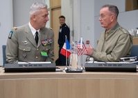 Marine Corps Gen. Joe Dunford, chairman of the Joint Chiefs of Staff, meets with Chief of the Defence Staff of the French Armed Forces François Lecointre, during the 180th North Atlantic Treaty Organization Military Committee in Chiefs of Defense Session (MC/CS) at NATO headquarters in Brussels, Belgium, Jan. 16, 2019.