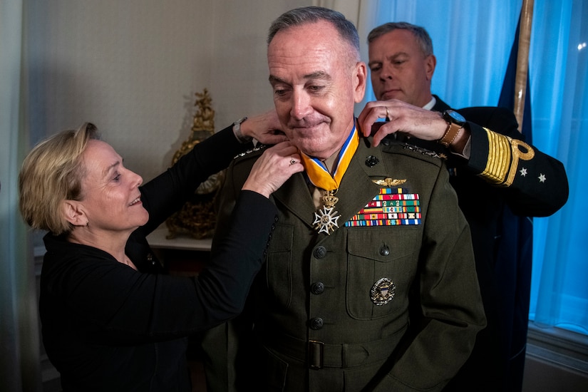 Dutch Defense Minister Ank Bijleveld, left, and Dutch Navy Adm. Rob Bauer, the Netherlands’ chief of defense, right, present the Order of Orange-Nassau to Marine Corps Gen. Joe Dunford, chairman of the Joint Chiefs of Staff, during an award ceremony at the Binnenhof in The Hague, Netherlands.