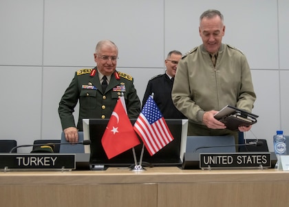 Marine Corps Gen. Joe Dunford, chairman of the Joint Chiefs of Staff, meets with his counterpart Turkish Army Gen. Yasar Güler, Chief of the Turkish General Staff, after the 180th North Atlantic Treaty Organization Military Committee in Chiefs of Defense Session (MC/CS) at NATO headquarters in Brussels, Belgium, Jan. 16, 2019.