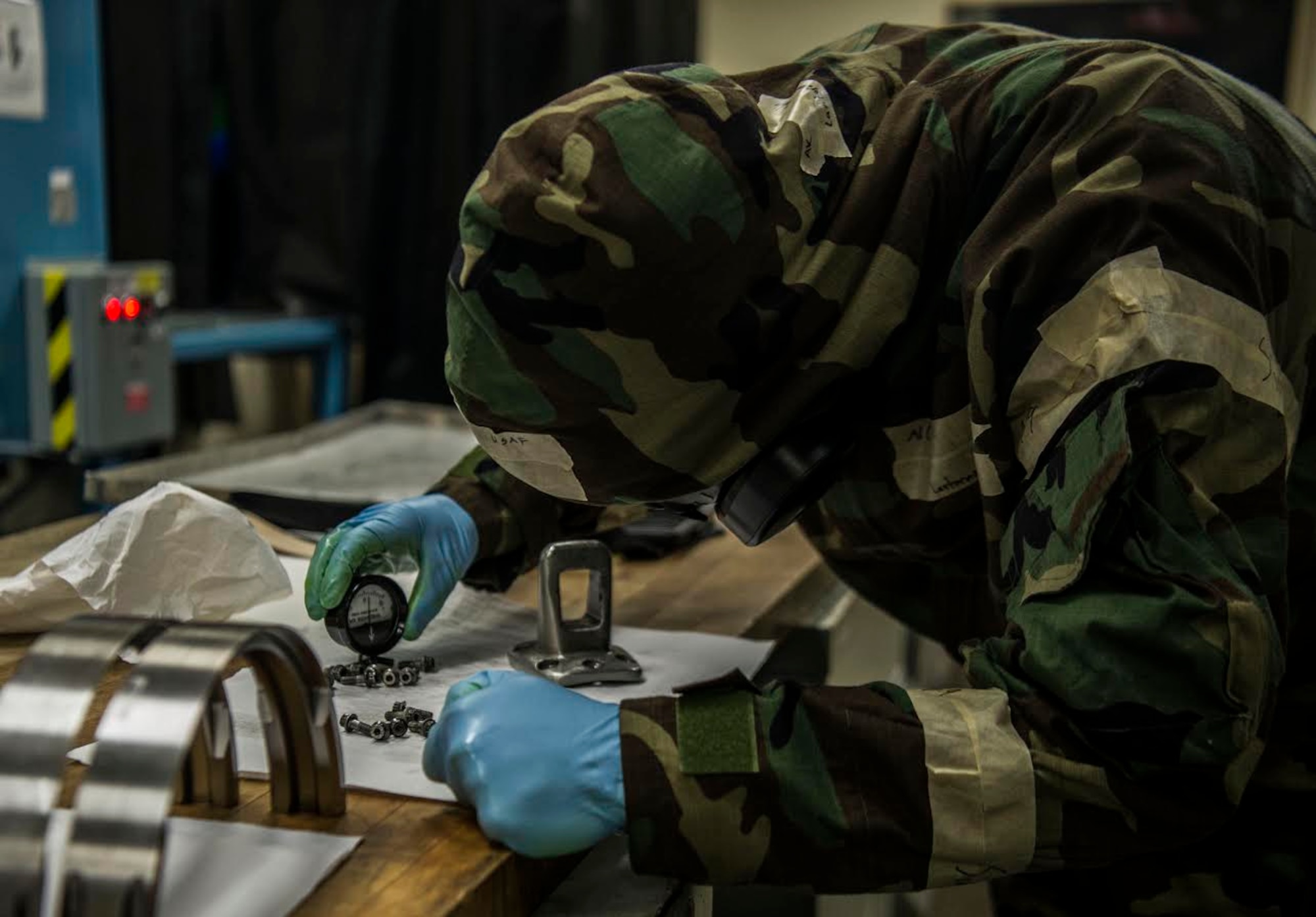 U.S. Air Force Airman 1st Class Colin Lanterman, 20th Equipment Maintenance Squadron non-destructive inspection apprentice, checks parts to ensure a magnetic field was completely removed at Shaw Air Force Base, S.C., Jan. 15, 2019.