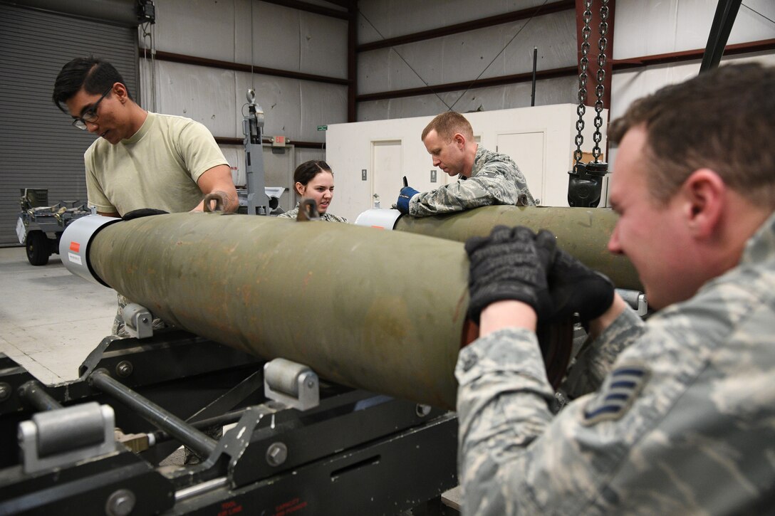 388th Maintenance Squadron Munitions Flight builds bombs during training.