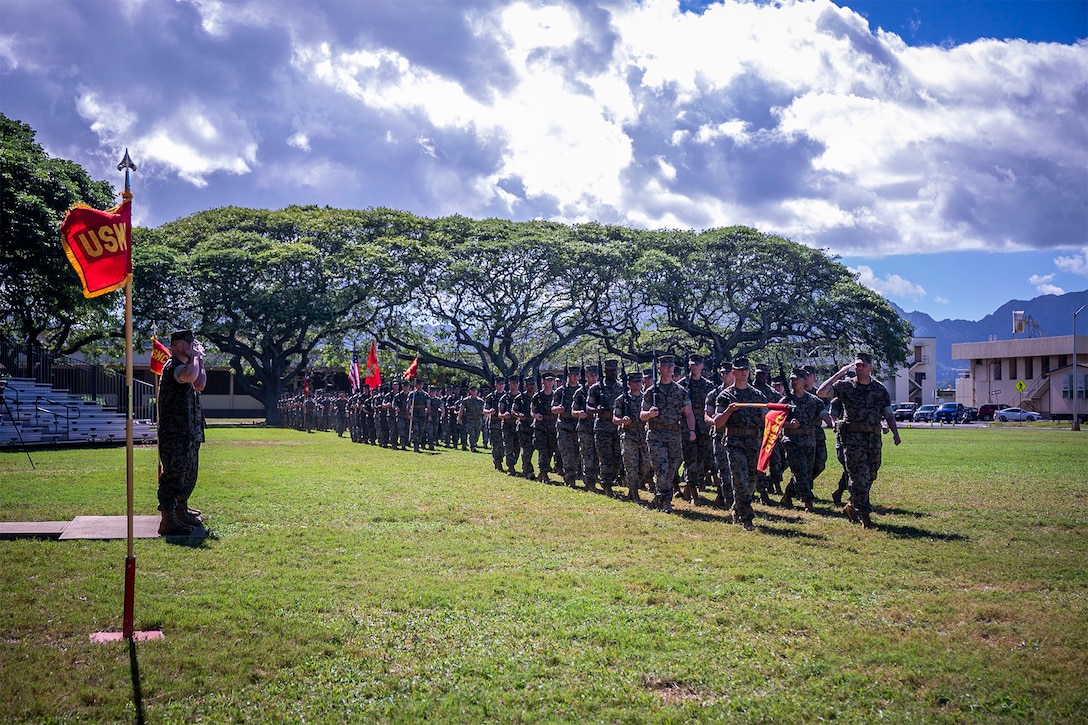 Marines march during a relief and appointment ceremony