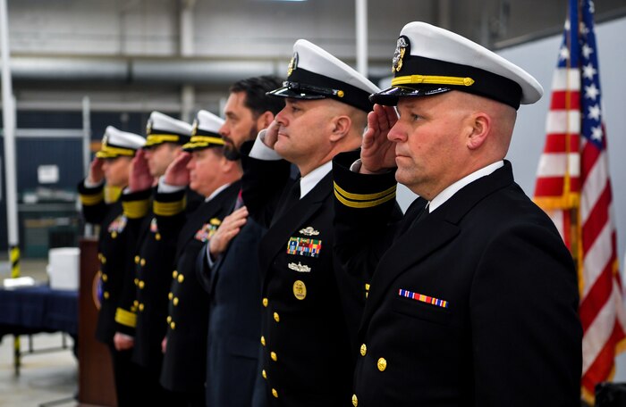 The official party salutes the colors during the National Anthem Jan. 16, 2018, at Joint Base Charleston, S.C.