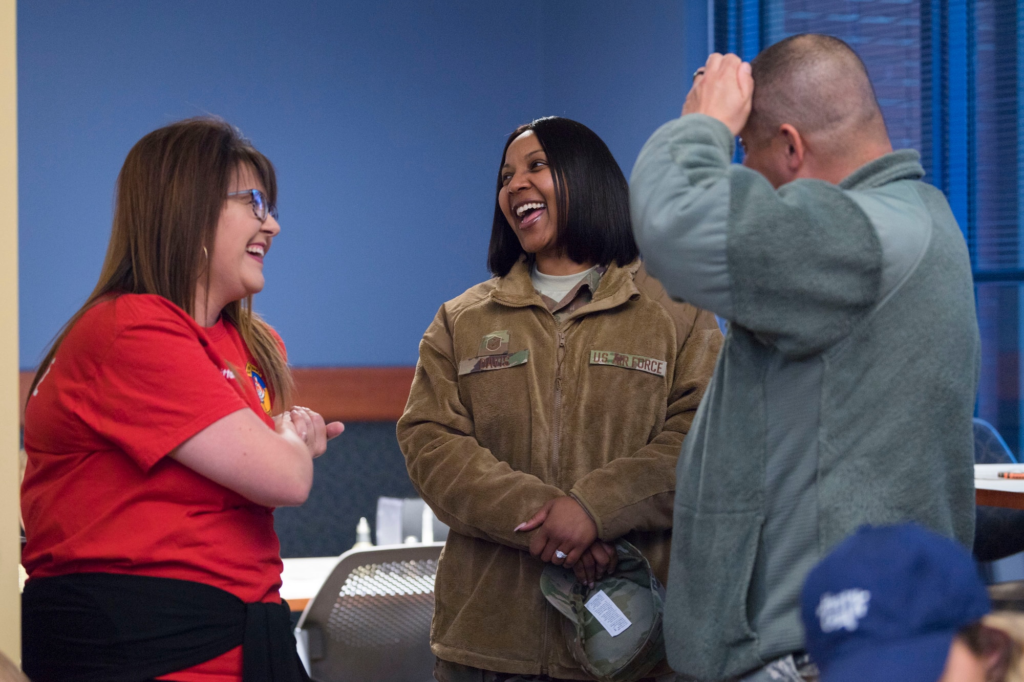 Participants socialize during a deployed spouses dinner, Jan. 15, 2019, at Moody Air Force Base, Ga. The mission’s success depends on resilient Airmen and families who are prepared to make sacrifices with the support of their fellow Airmen, local communities and leadership. (U.S. Air Force photo by Airman Taryn Butler)