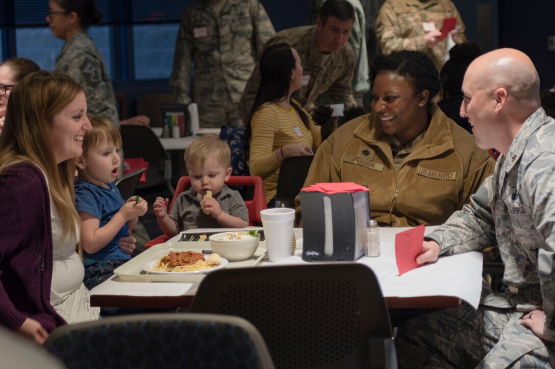 Guests laugh during a deployed spouses dinner, Jan. 15, 2019, at Moody Air Force Base, Ga. The mission’s success depends on resilient Airmen and families who are prepared to make sacrifices with the support of their fellow Airmen, local communities and leadership. (U.S. Air Force photo by Airman Taryn Butler)
