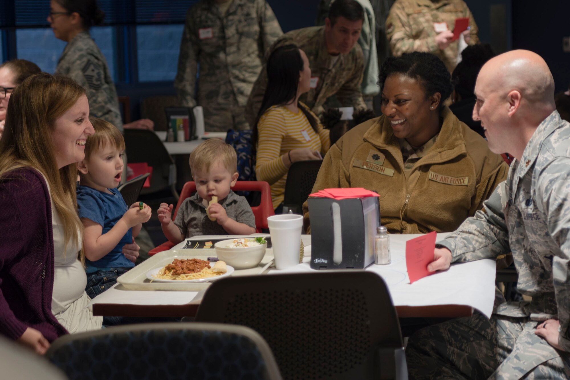 Guests laugh during a deployed spouses dinner, Jan. 15, 2019, at Moody Air Force Base, Ga. The mission’s success depends on resilient Airmen and families who are prepared to make sacrifices with the support of their fellow Airmen, local communities and leadership. (U.S. Air Force photo by Airman Taryn Butler)