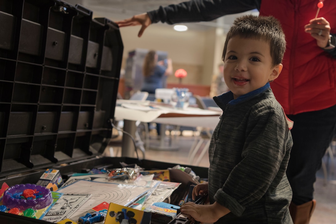 A participant poses for a photo during a deployed spouses dinner, Jan. 15, 2019, at Moody Air Force Base, Ga. The mission’s success depends on resilient Airmen and families, who are prepared to make sacrifices with the support of their fellow Airmen, local communities and leadership. (U.S. Air Force photo by Airman Taryn Butler)