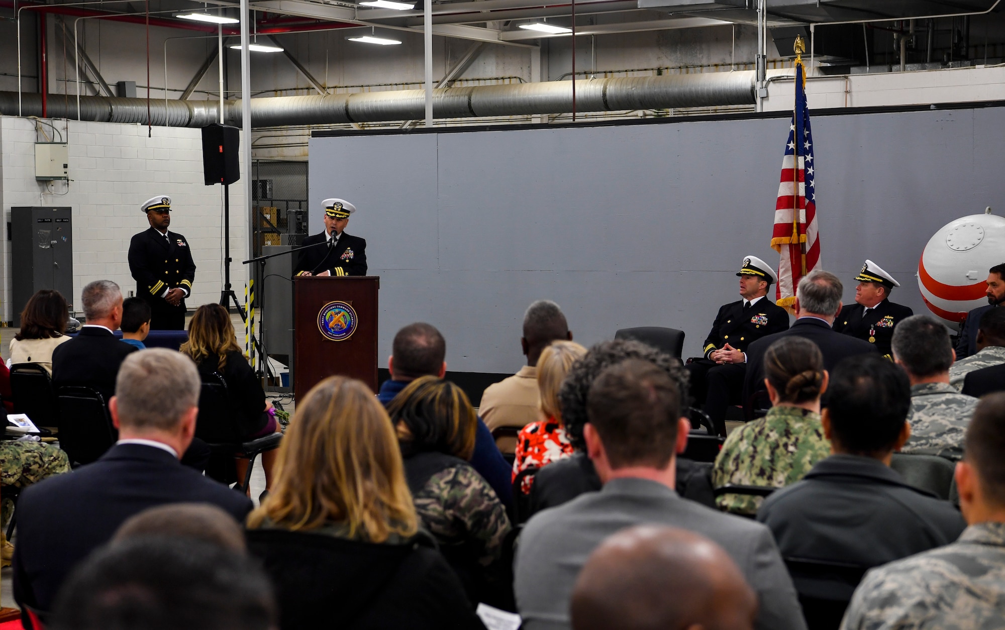 Cmdr. William Edenbeck, Navy Munitions Command Atlantic Unit Charleston commanding officer, gives a speech after assuming command of NMC Jan. 16, 2018, at Joint Base Charleston, S.C.